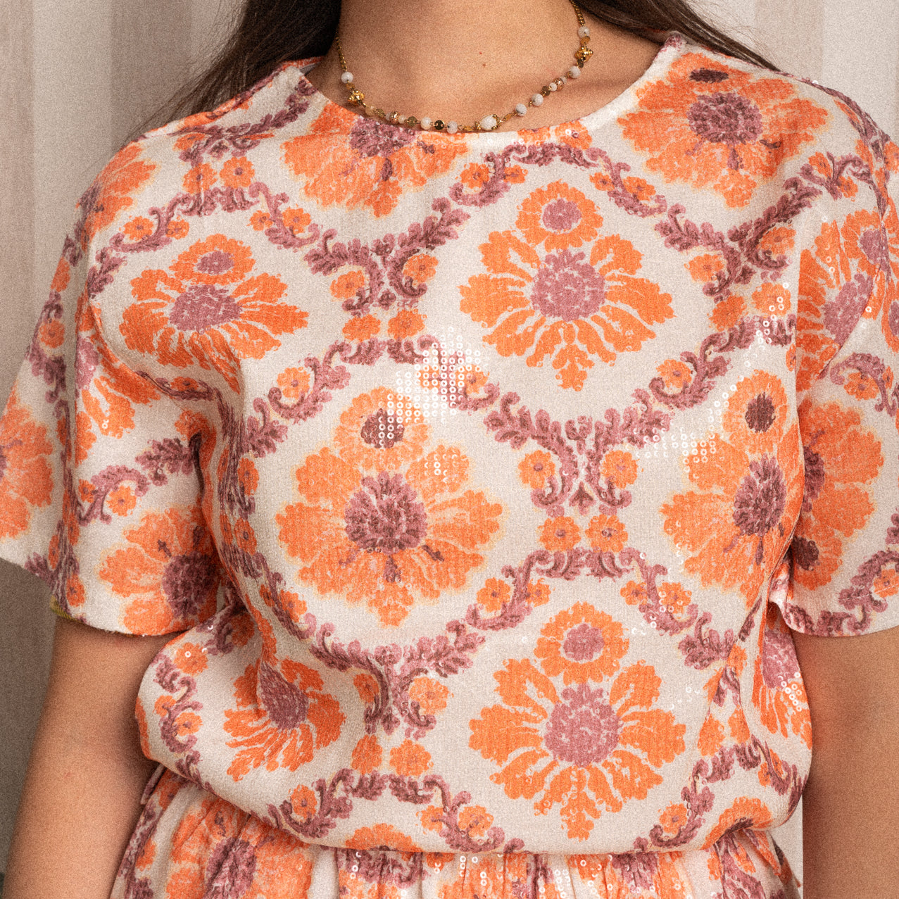 T-shirt a fantasia con paillettes