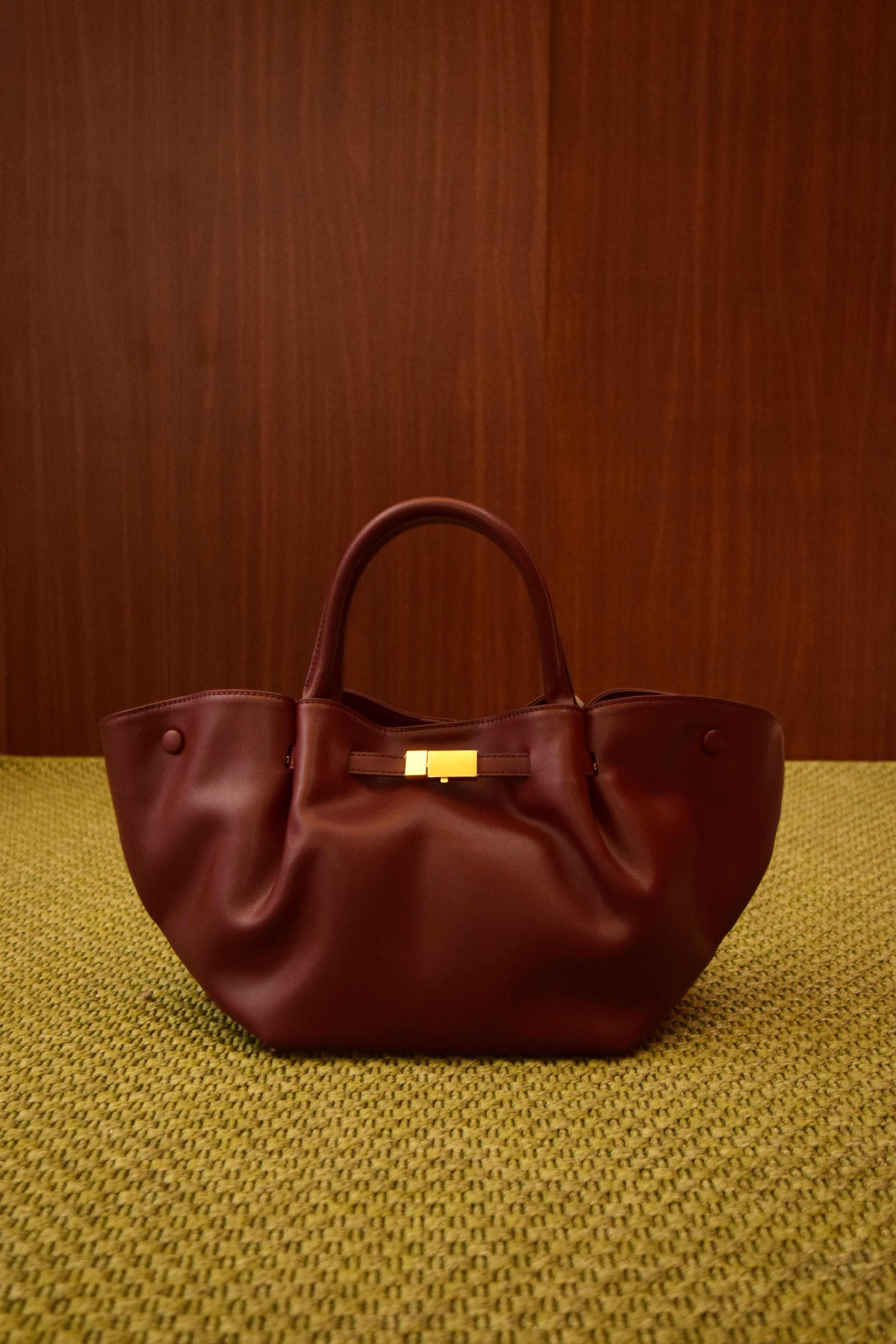 borsa-mano-vera-pelle-bordeaux-chiusura-oro