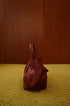 borsa-mano-vera-pelle-bordeaux-chiusura-oro