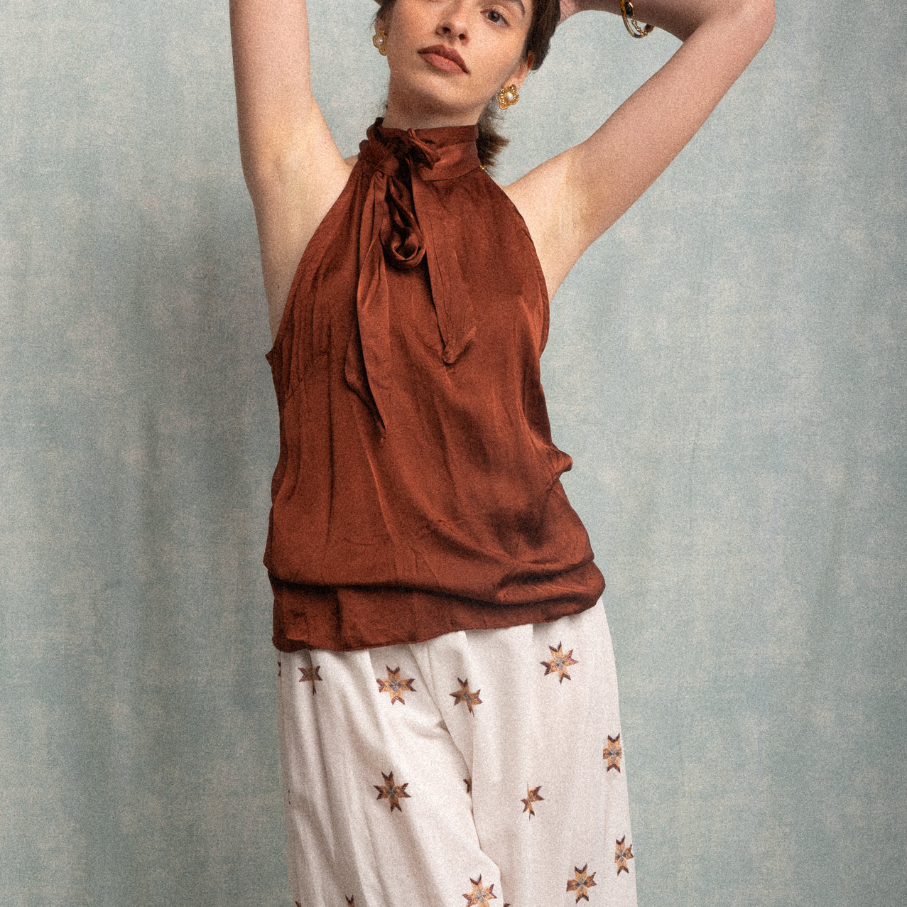 Top smanicato color bronzo