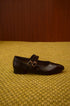 alt="Scarpe Mary Jane a punta bordeaux scuro con doppio cinturino"
