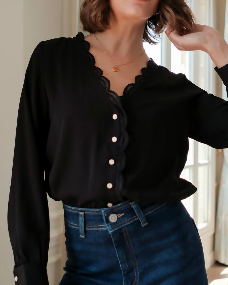 Blusa nera con ricami