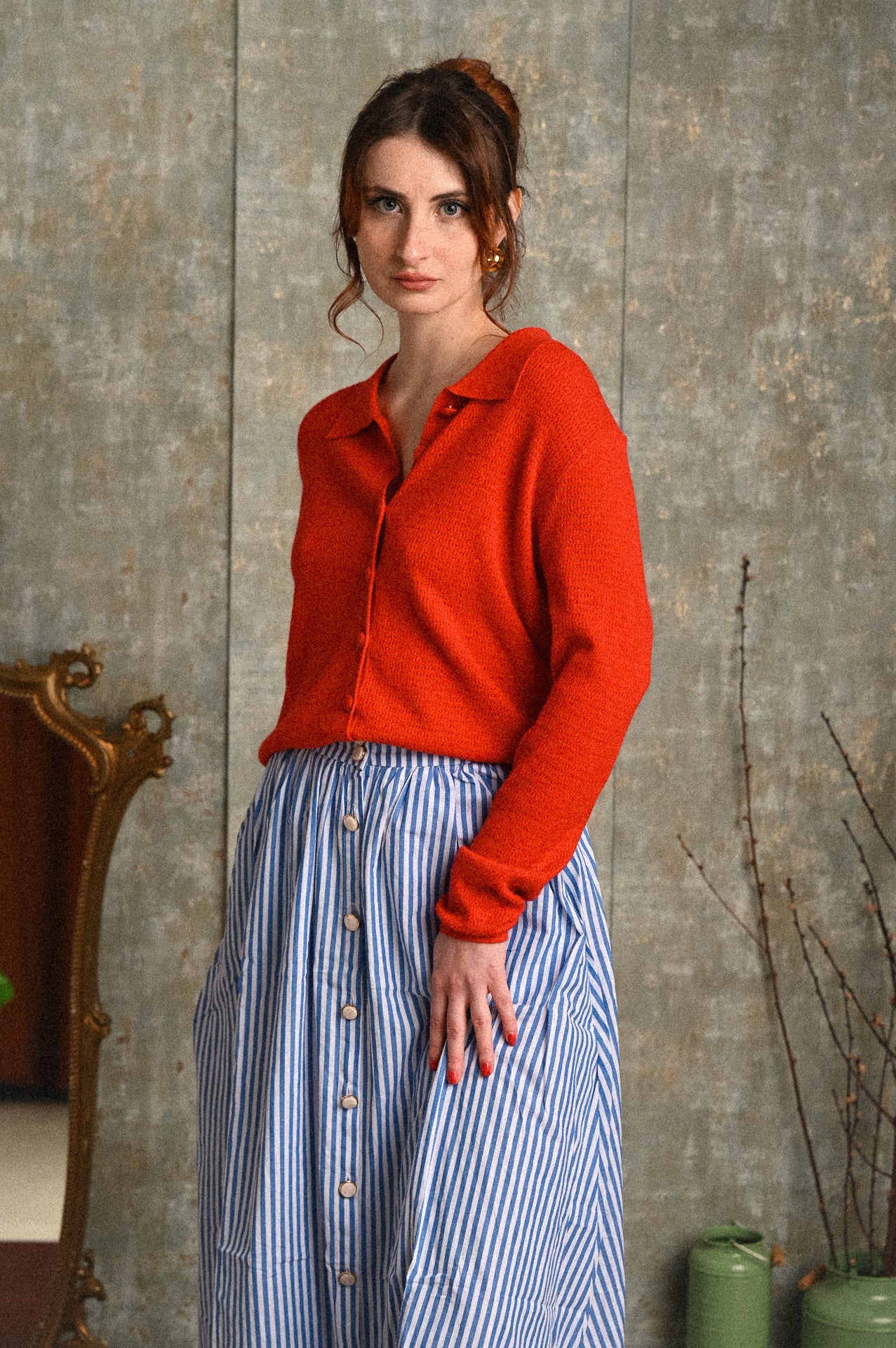 Cardigan Melograno rosso con colletto polo e lavorazione traforata