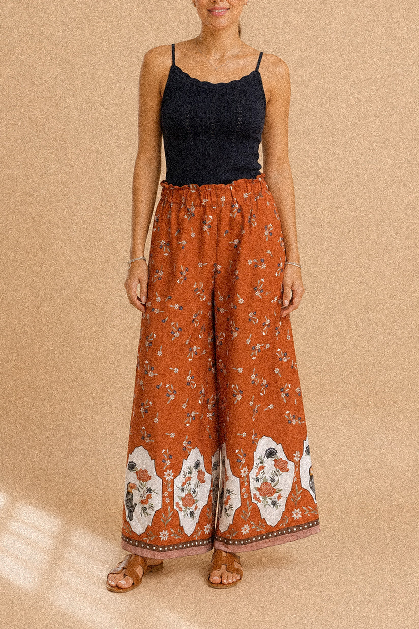Pantalone Palazzo “Terracotta Bloom” – Fantasia Floreale