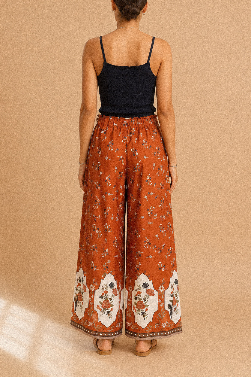 Pantalone Palazzo “Terracotta Bloom” – Fantasia Floreale