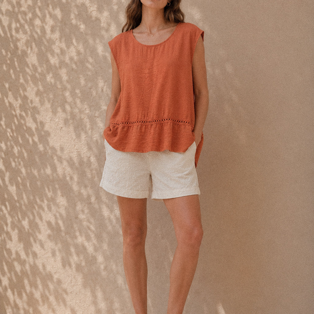 Top smanicato In terracotta