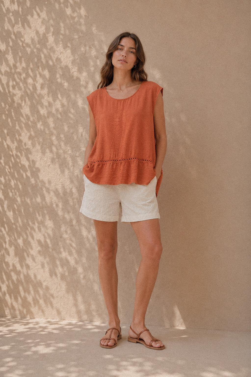Top smanicato In terracotta