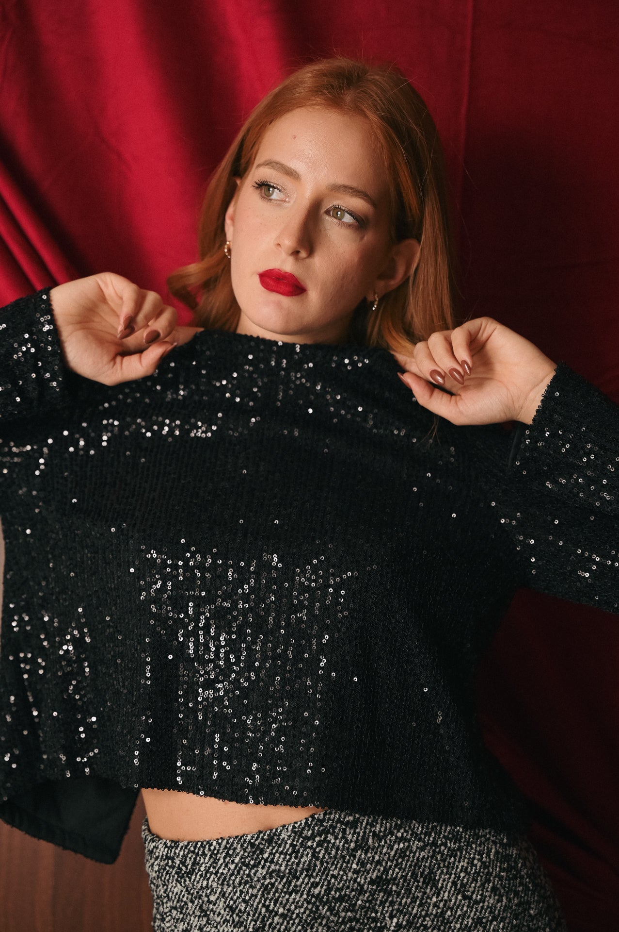 Top paillettes nero manica lunga