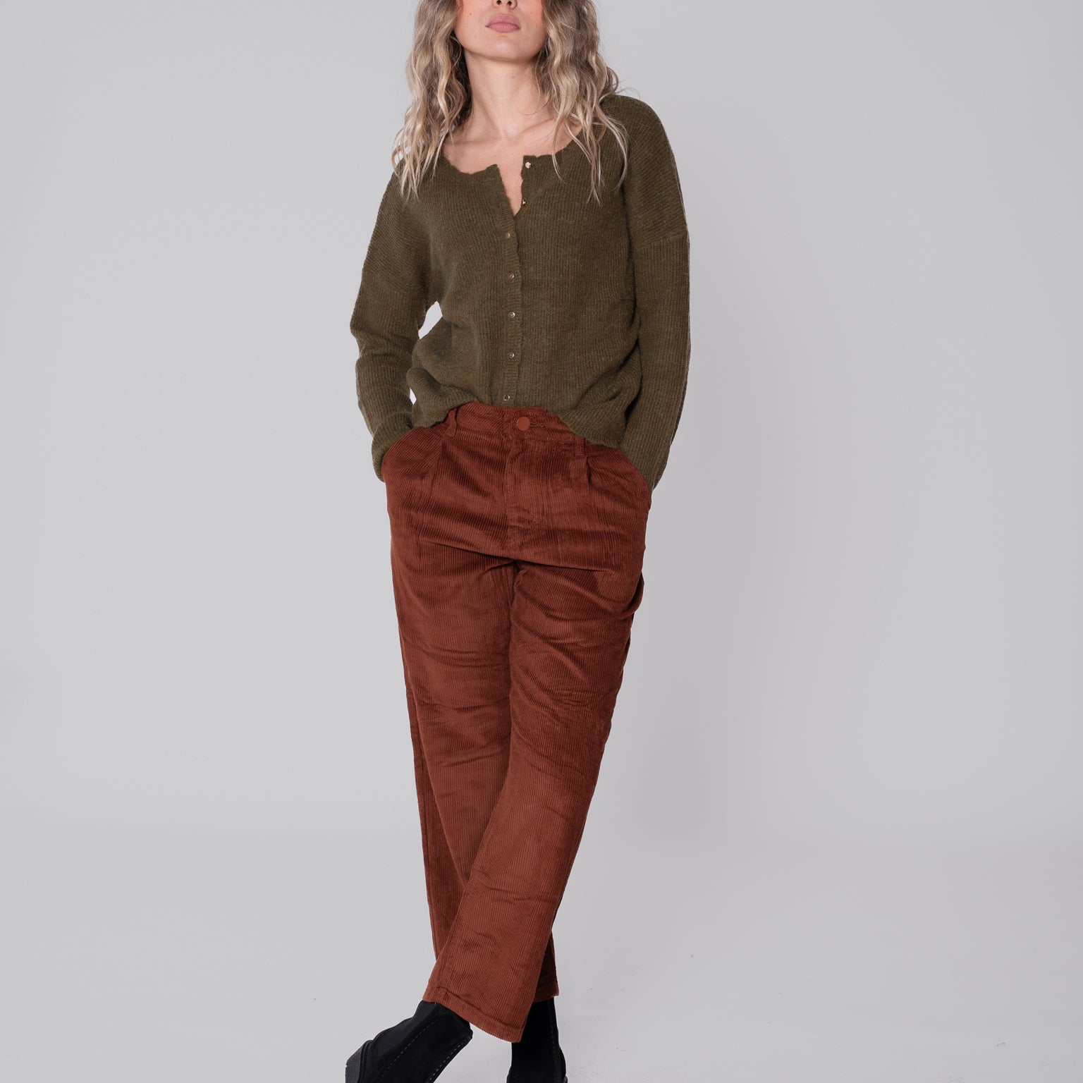 Rust colored velvet trousers