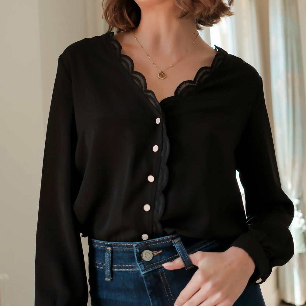 Blusa nera con ricami