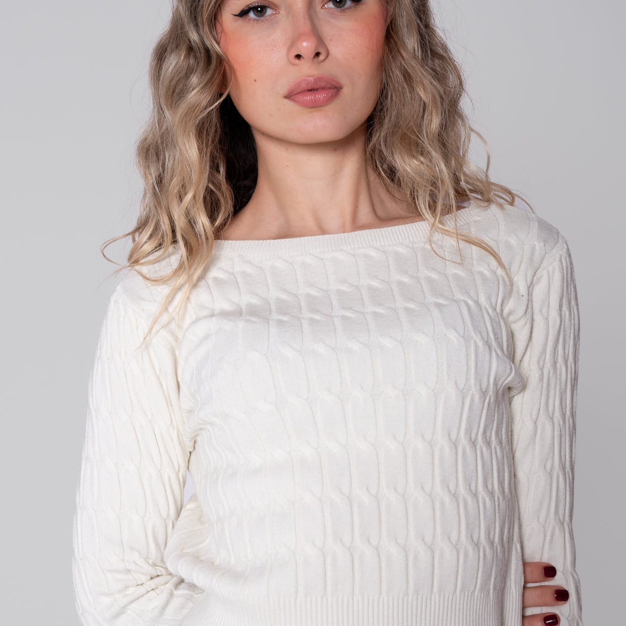 White sweater with woven pattern