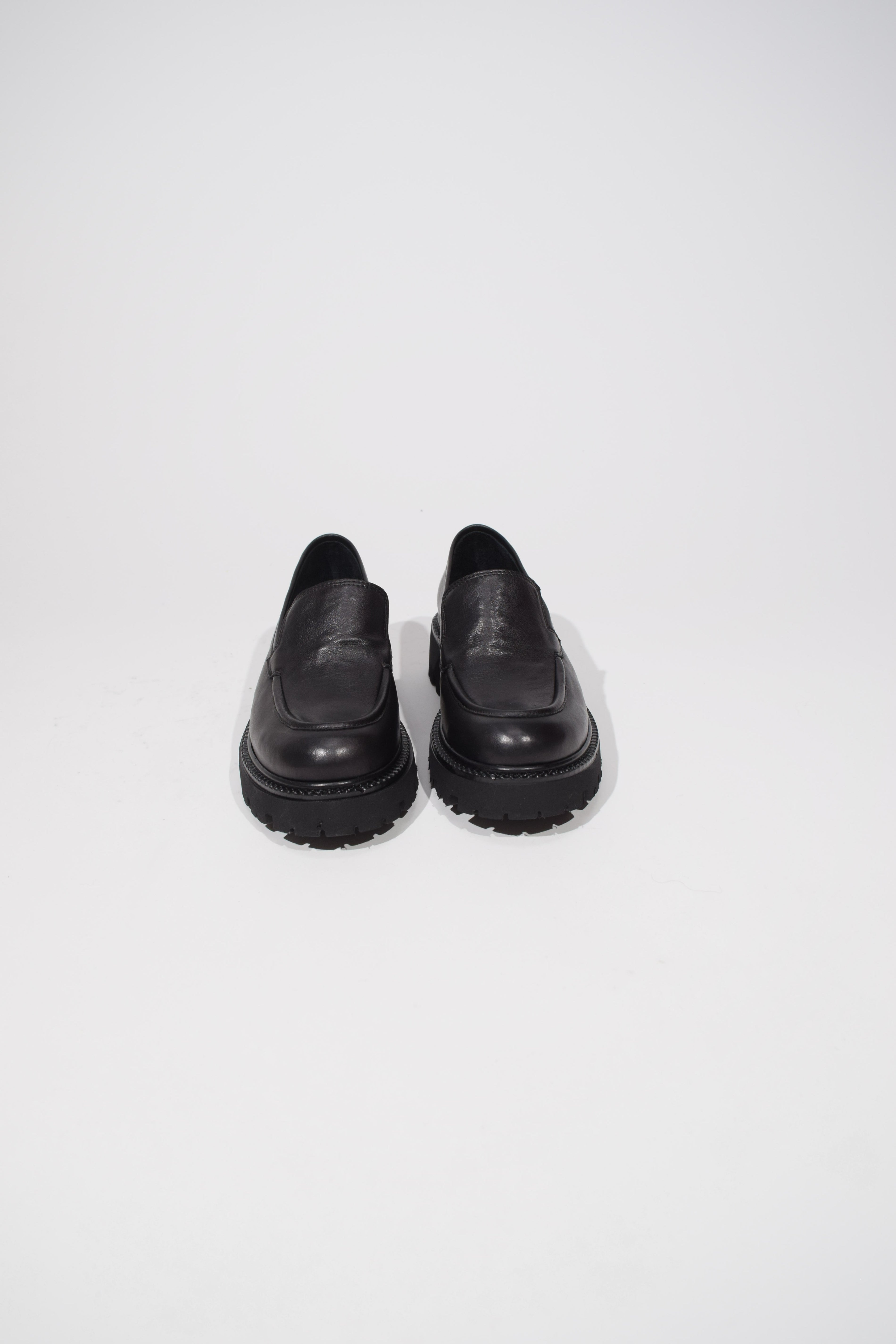 Black leather slip-on loafer