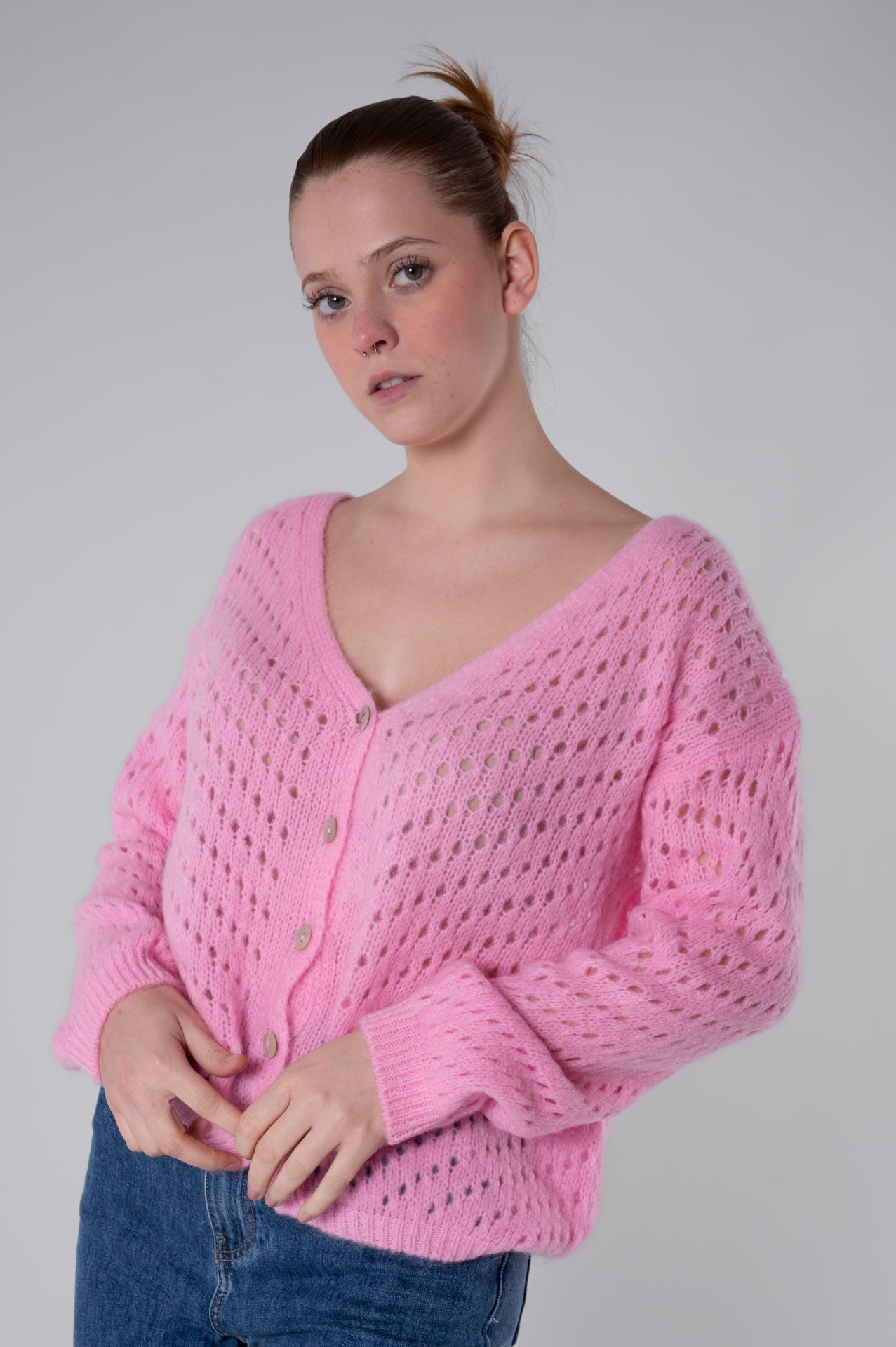 Cardigan rosa traforato