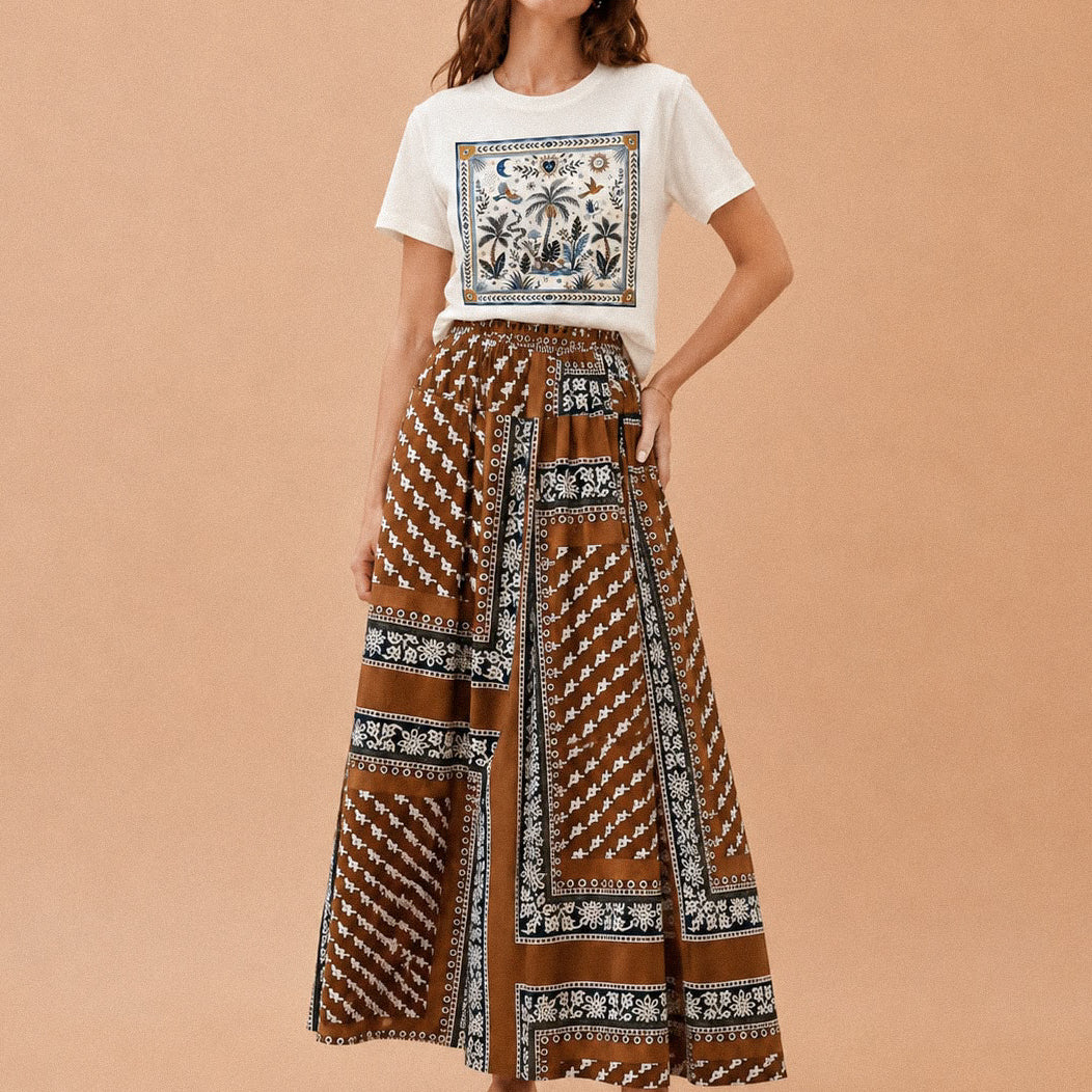 T-shirt bianca con stampa rondini