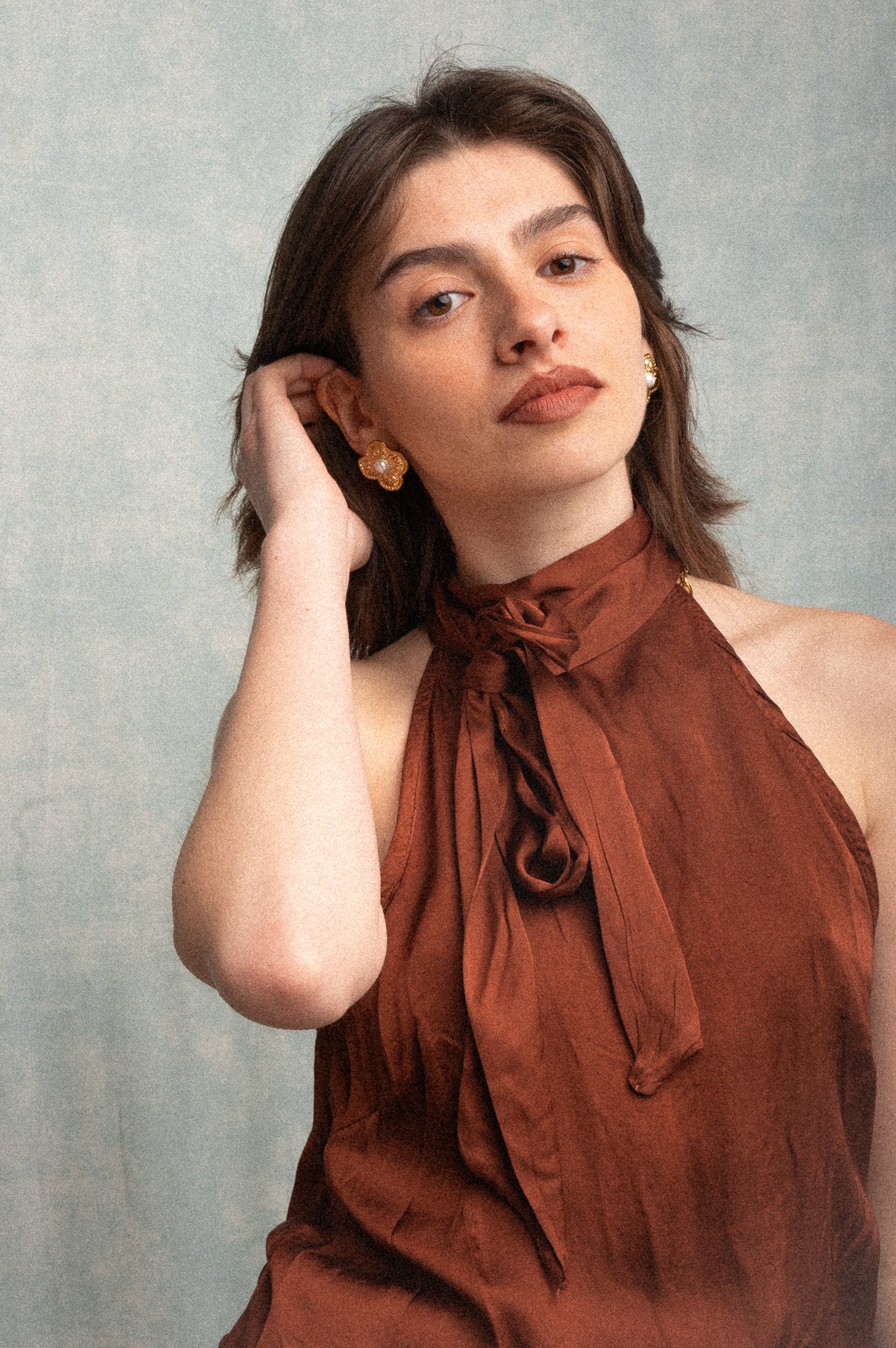 Top smanicato color bronzo