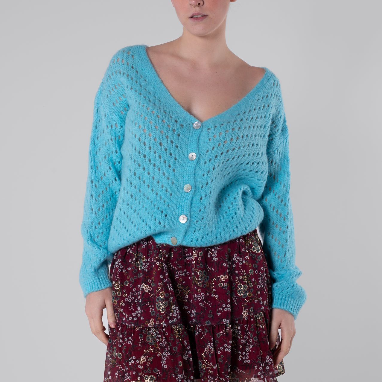 Cardigan azzurro traforato