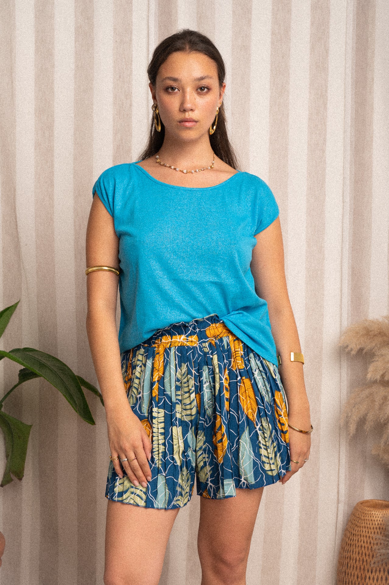 Top smanicato azzurro