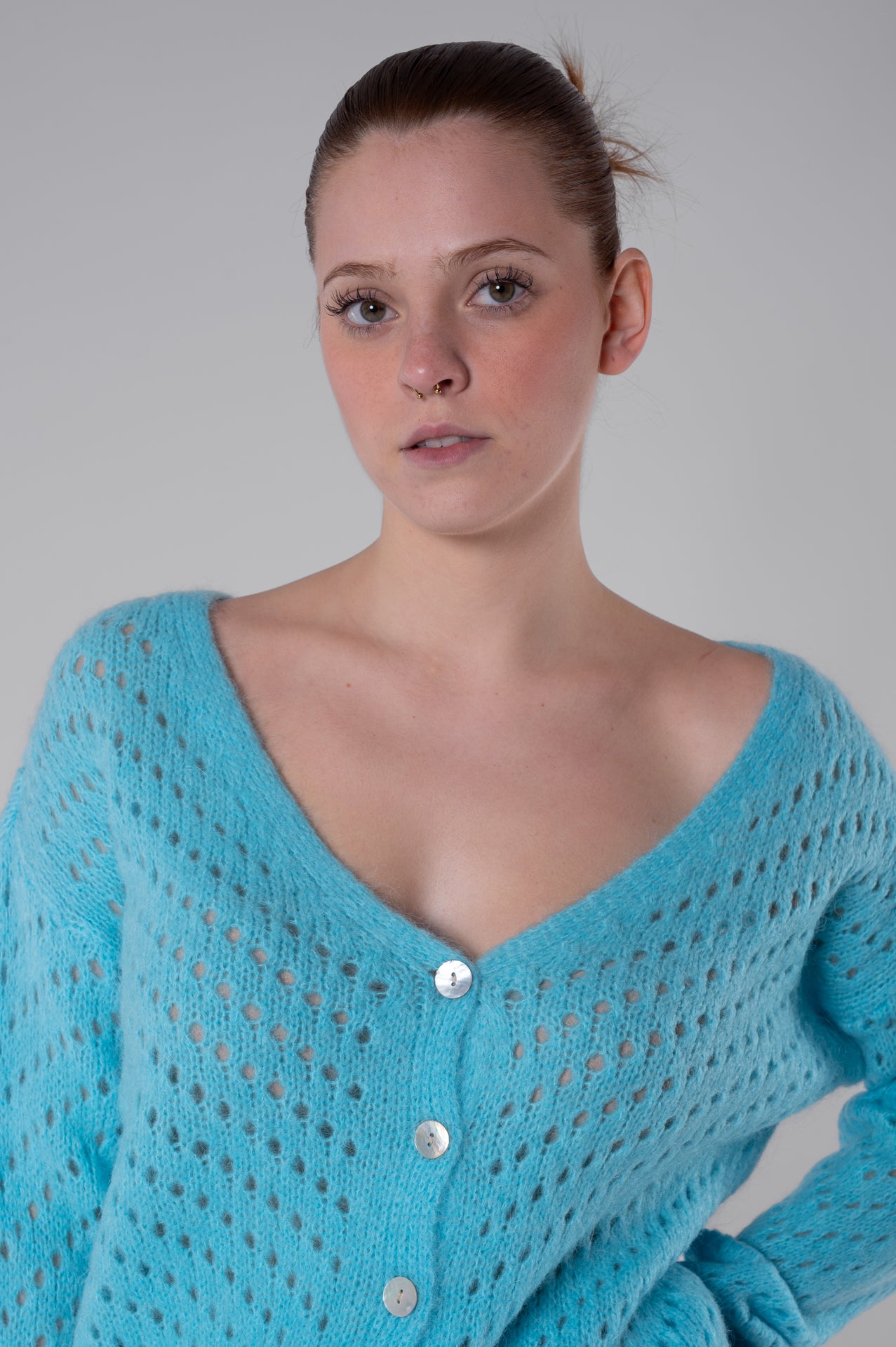 Cardigan azzurro traforato