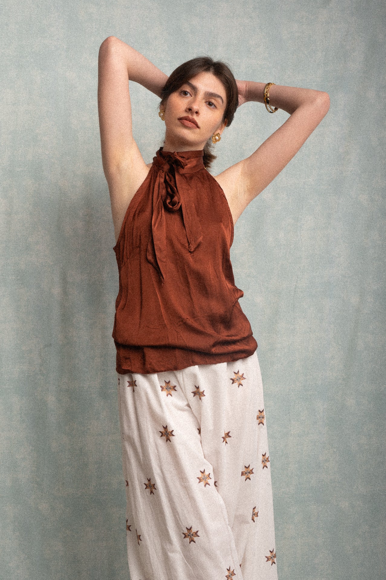 Top smanicato color bronzo