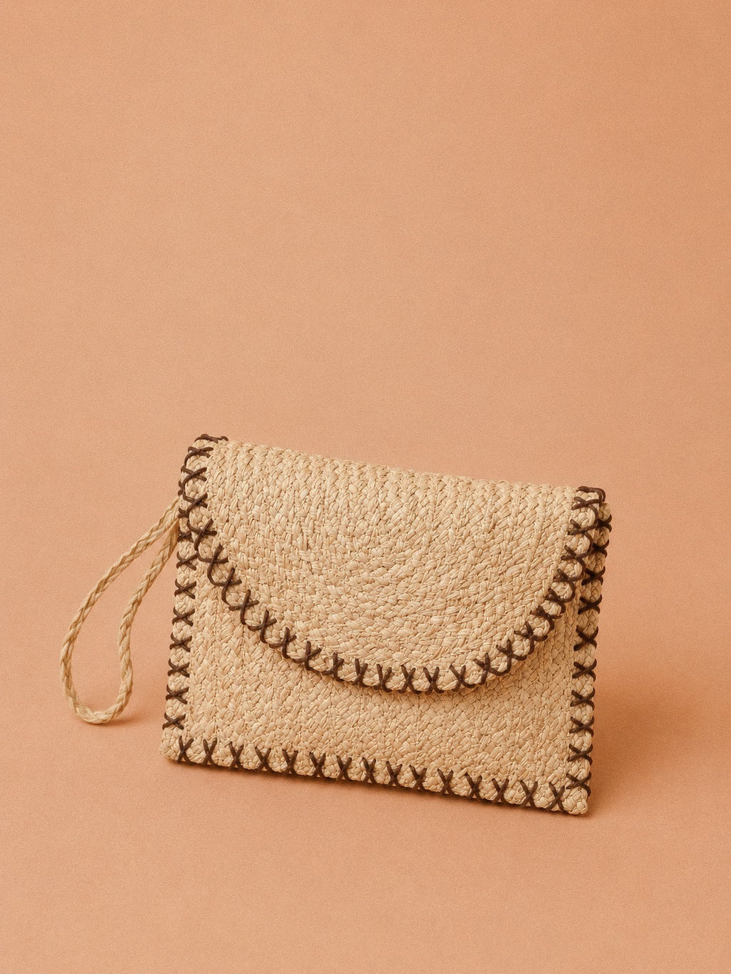 Pochette intrecciata con tracolla