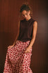 Polo donna smanicata in maglia a costine color cioccolato caffè